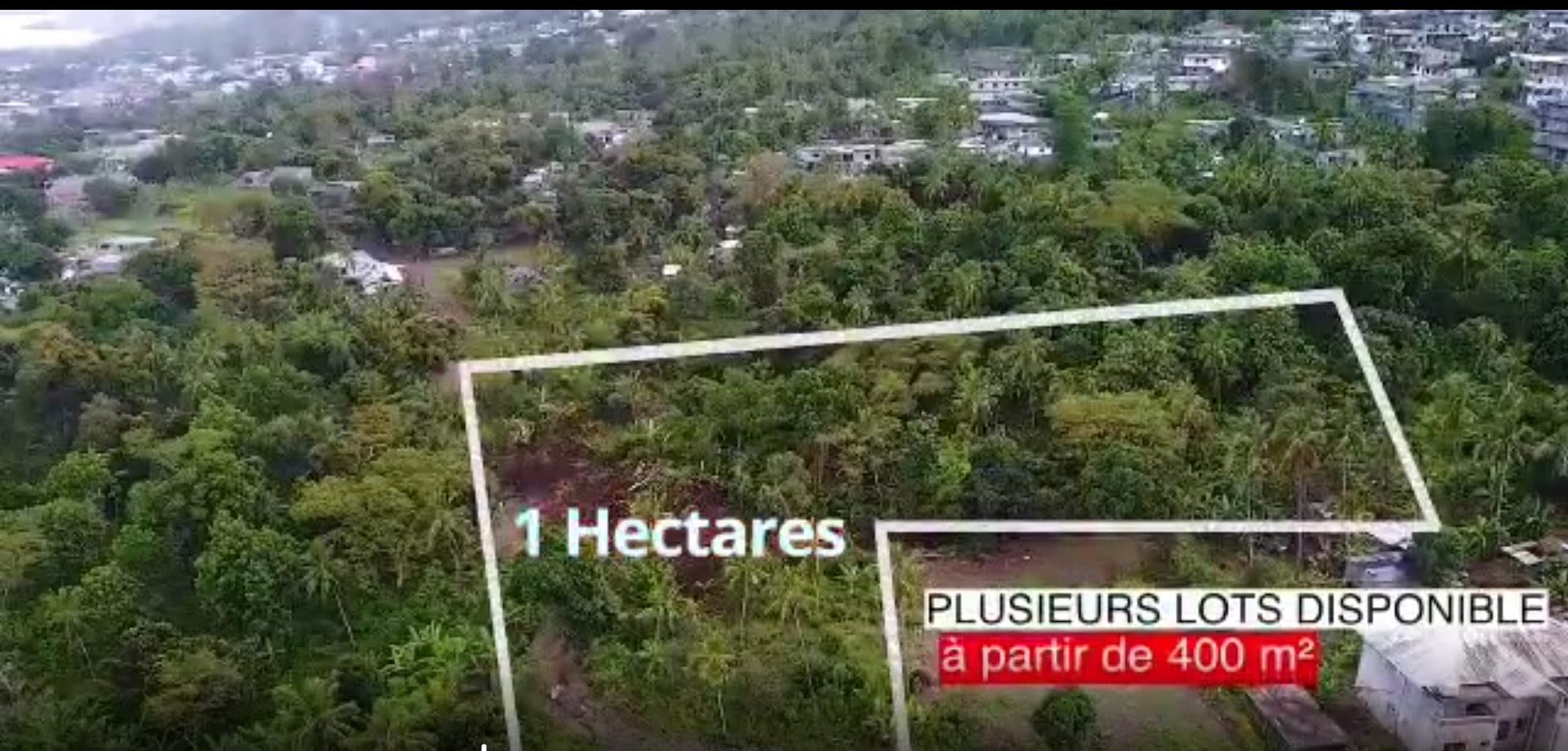 À vendre - Terrain constructible 400 m² situé à Tsidjé